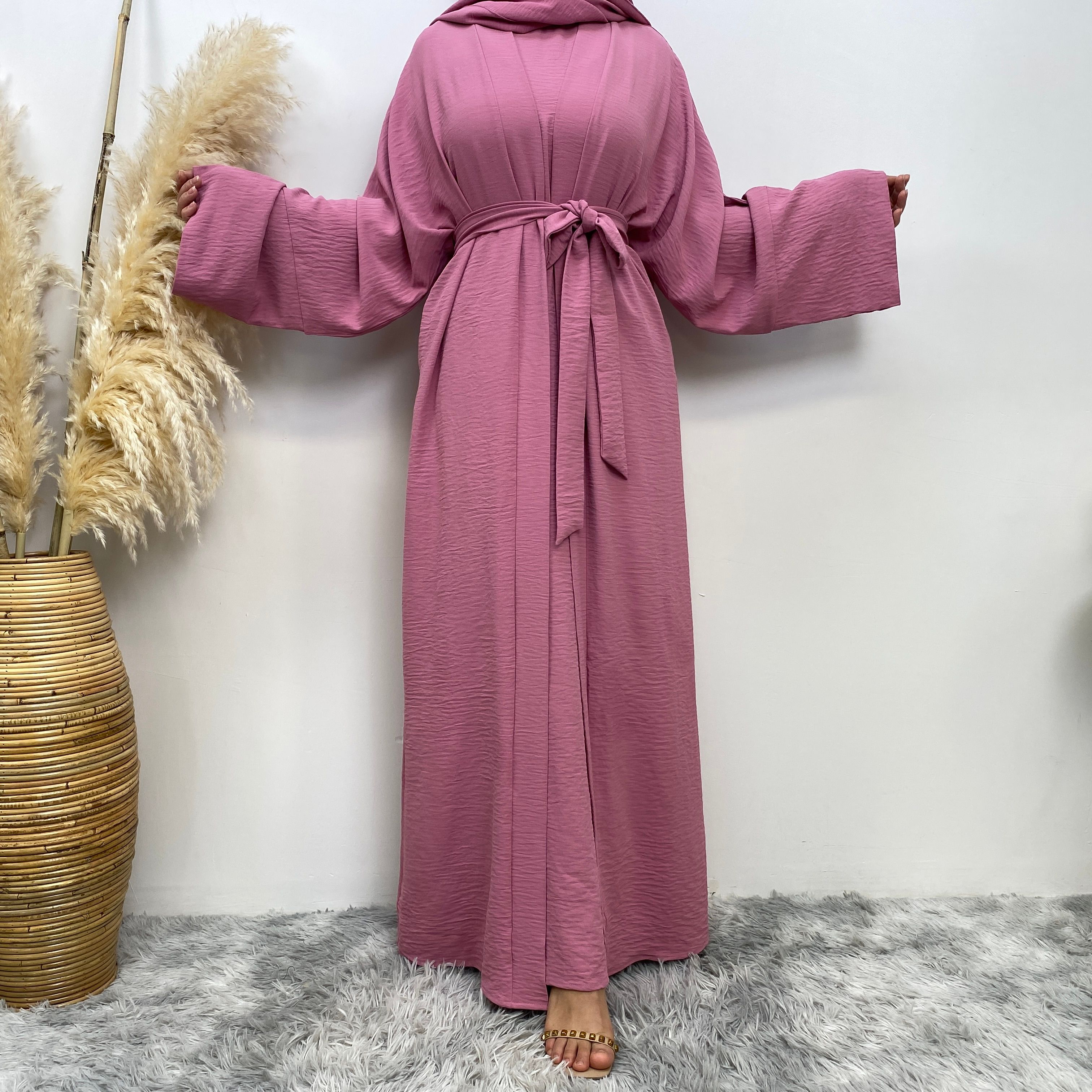 Middle Eastern simple and fashionable Muslim suit Abaya sleeveless dress with pockets for women cardigan dress