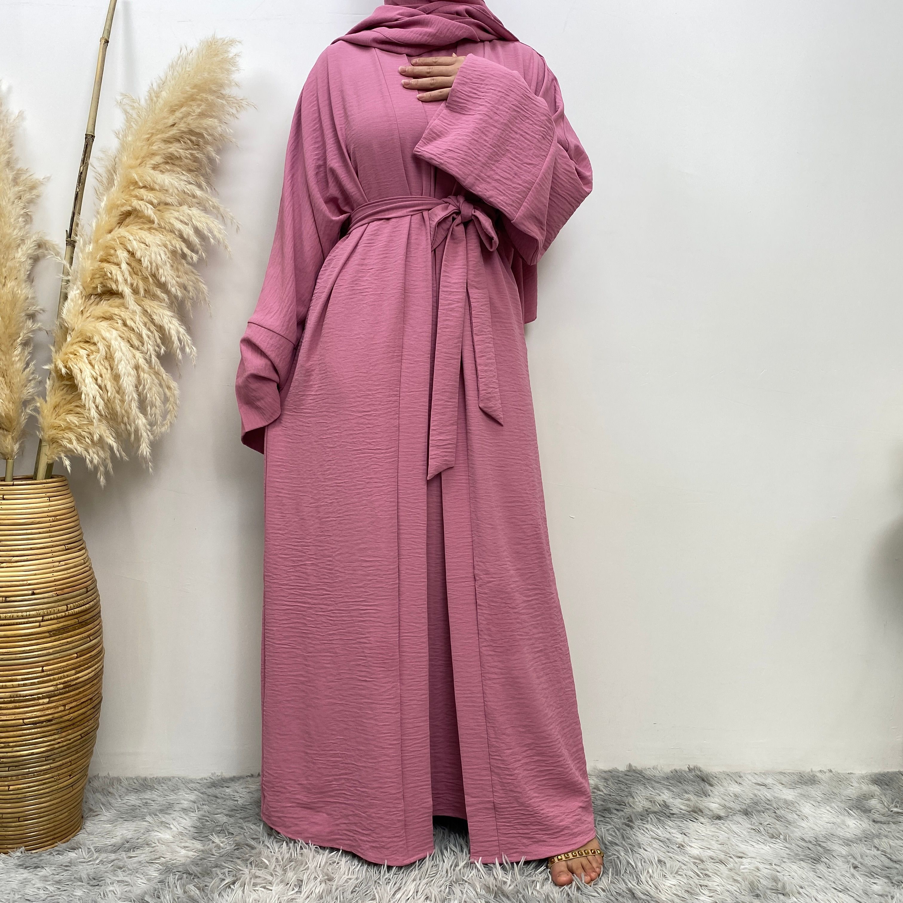 Middle Eastern simple and fashionable Muslim suit Abaya sleeveless dress with pockets for women cardigan dress