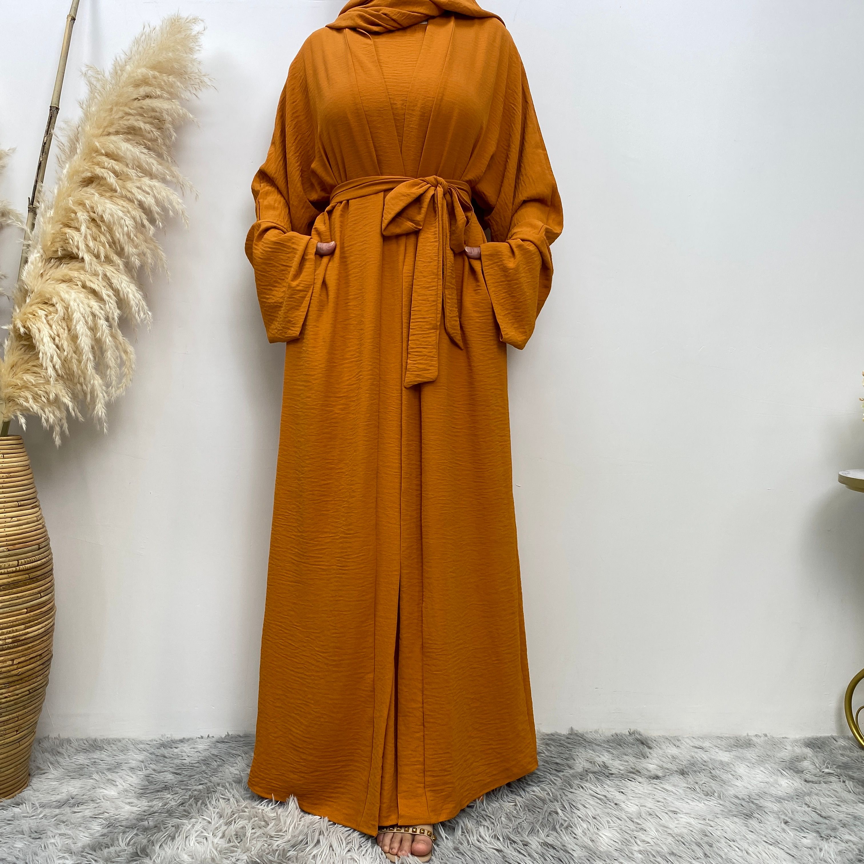 Middle Eastern simple and fashionable Muslim suit Abaya sleeveless dress with pockets for women cardigan dress