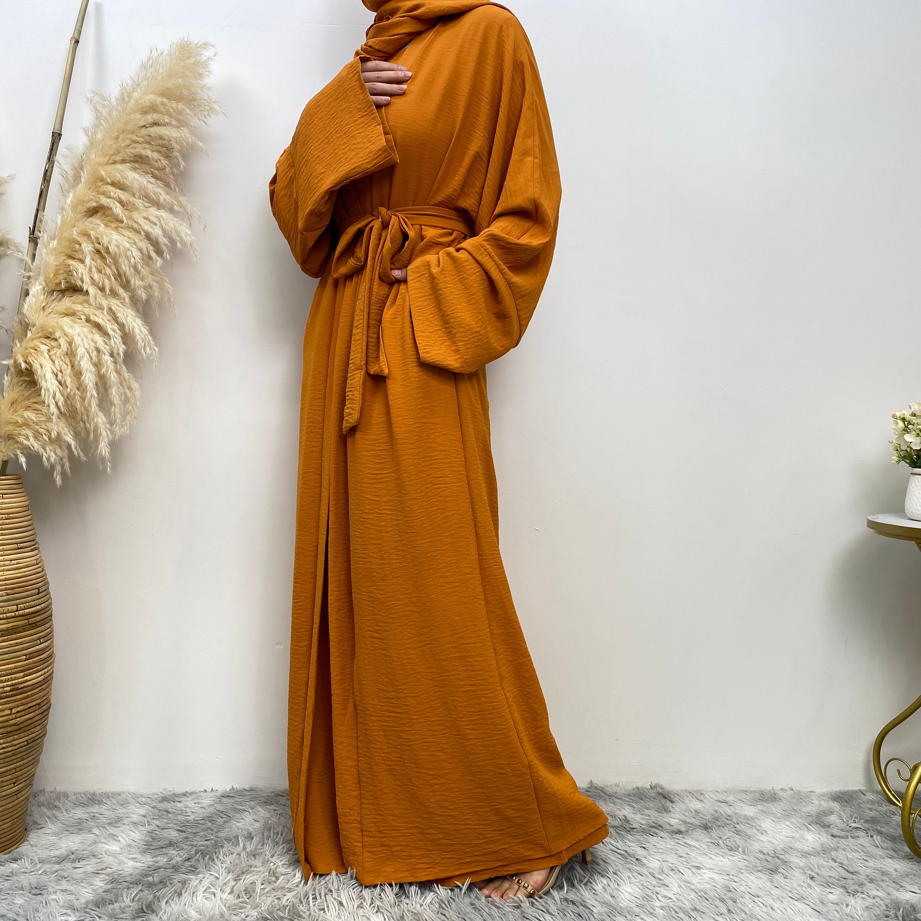 Middle Eastern simple and fashionable Muslim suit Abaya sleeveless dress with pockets for women cardigan dress
