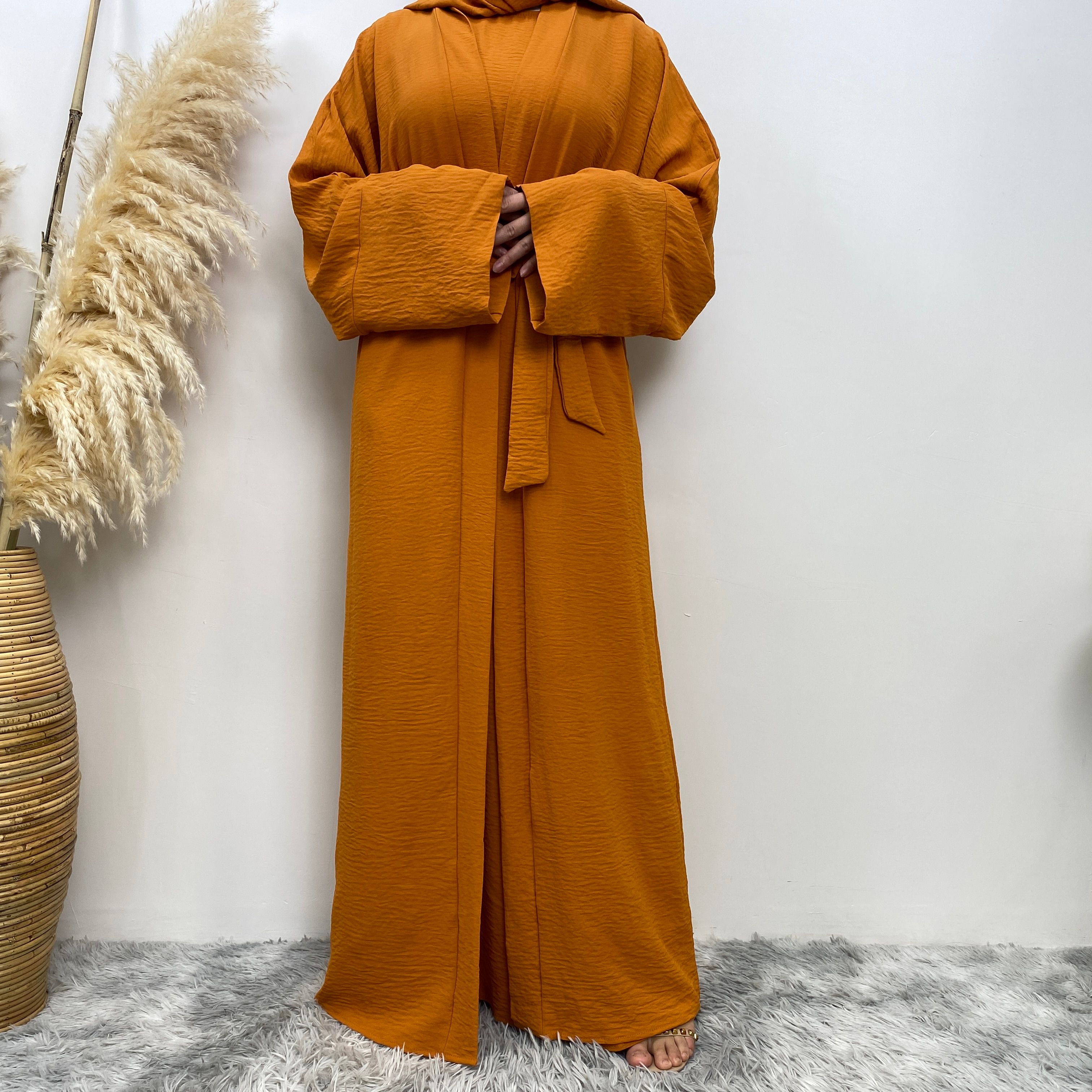 Middle Eastern simple and fashionable Muslim suit Abaya sleeveless dress with pockets for women cardigan dress