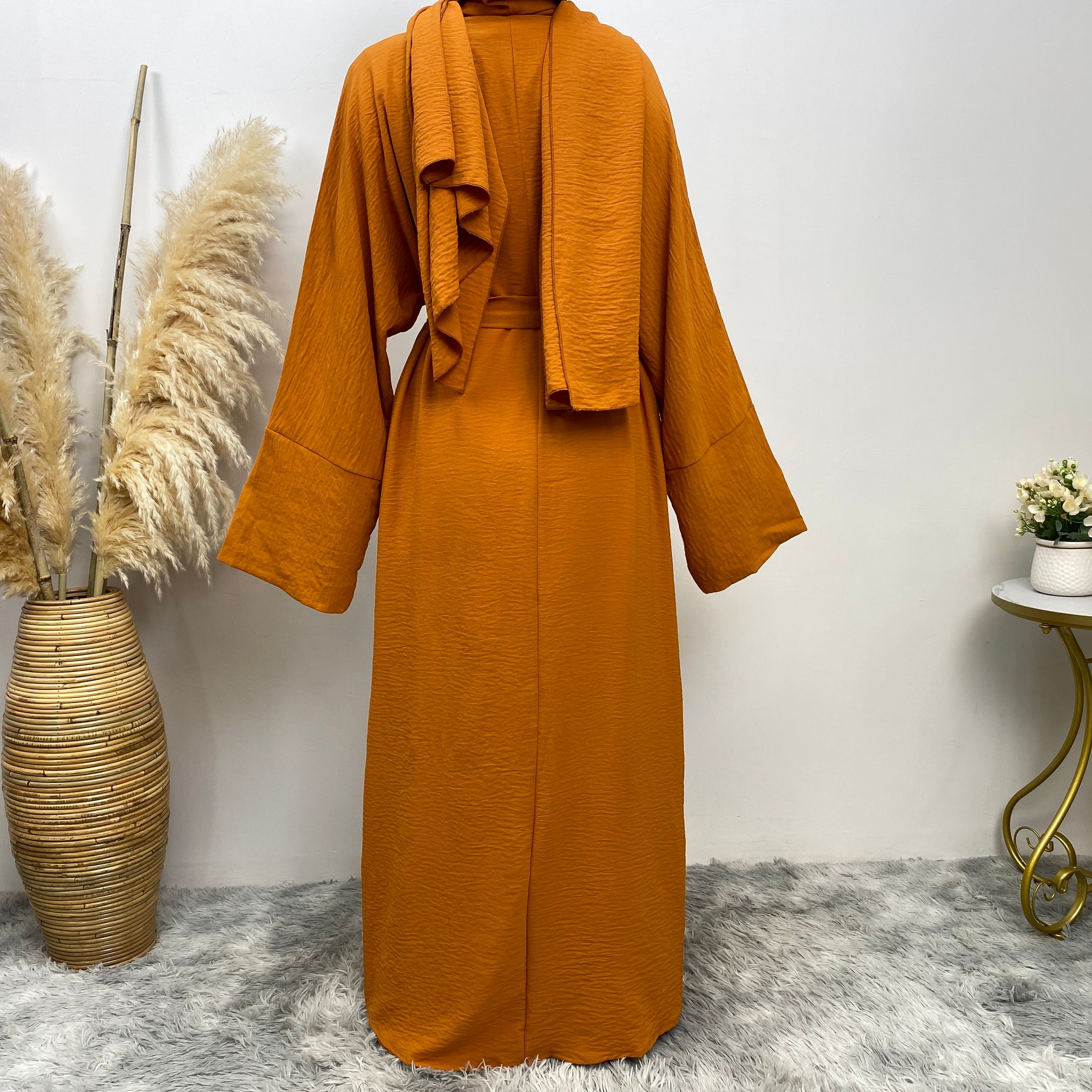 Middle Eastern simple and fashionable Muslim suit Abaya sleeveless dress with pockets for women cardigan dress