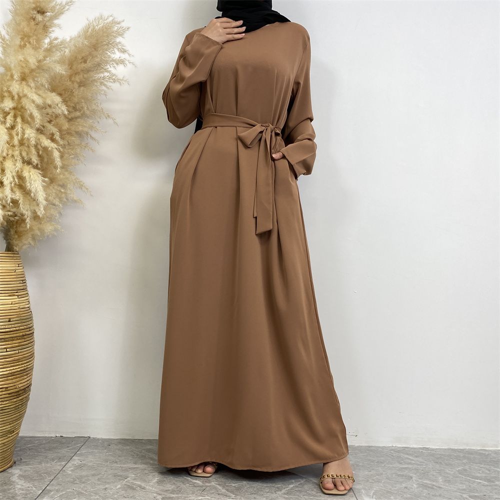 New Middle Eastern Muslim fashion, Dubai, Turkey and Africa's best-selling solid color tie and pocket Muslim dress