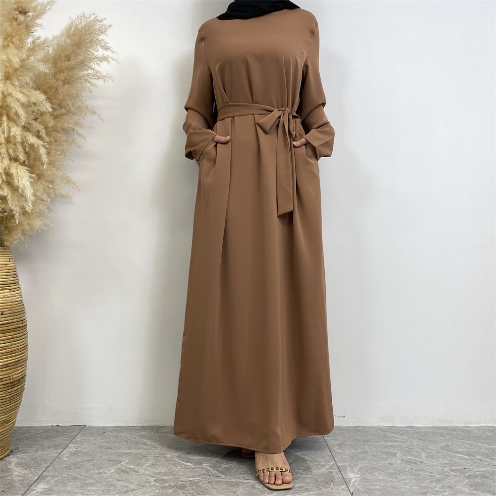 New Middle Eastern Muslim fashion, Dubai, Turkey and Africa's best-selling solid color tie and pocket Muslim dress