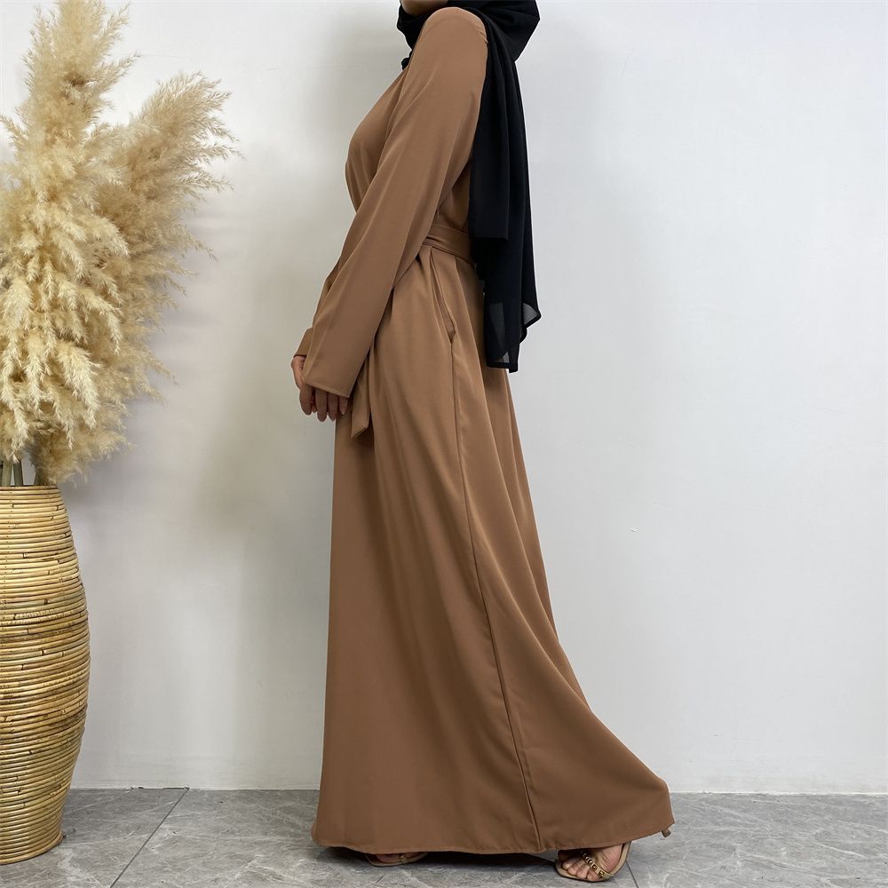 New Middle Eastern Muslim fashion, Dubai, Turkey and Africa's best-selling solid color tie and pocket Muslim dress