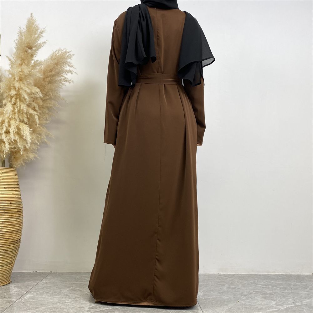New Middle Eastern Muslim fashion, Dubai, Turkey and Africa's best-selling solid color tie and pocket Muslim dress