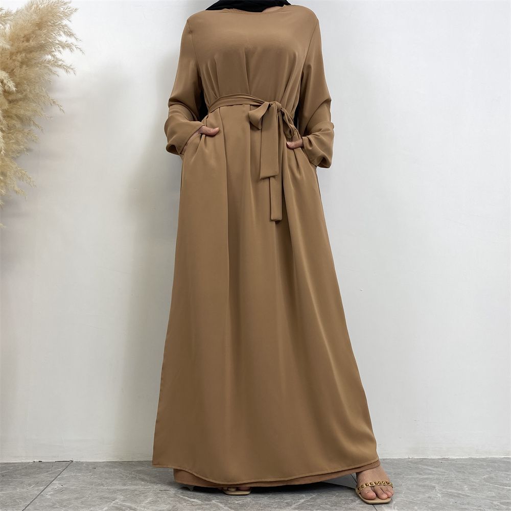 New Middle Eastern Muslim fashion, Dubai, Turkey and Africa's best-selling solid color tie and pocket Muslim dress