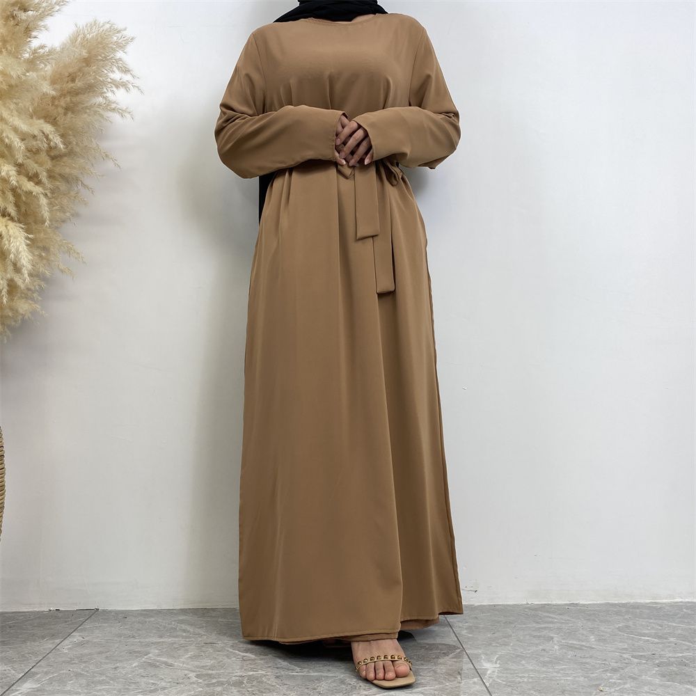 New Middle Eastern Muslim fashion, Dubai, Turkey and Africa's best-selling solid color tie and pocket Muslim dress