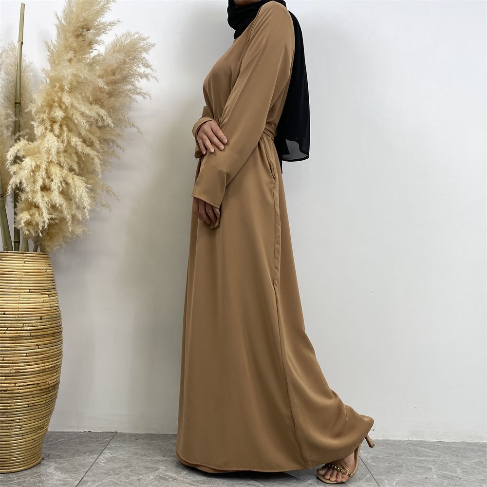 New Middle Eastern Muslim fashion, Dubai, Turkey and Africa's best-selling solid color tie and pocket Muslim dress