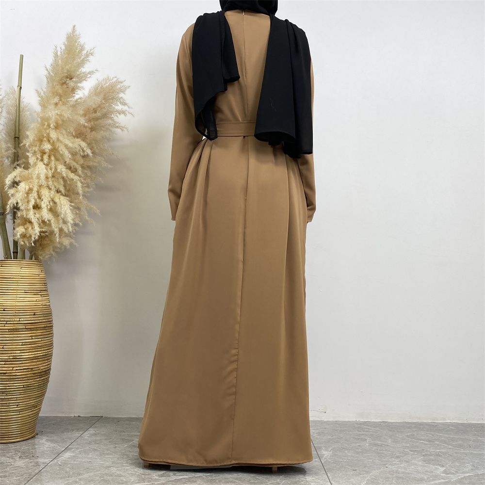New Middle Eastern Muslim fashion, Dubai, Turkey and Africa's best-selling solid color tie and pocket Muslim dress