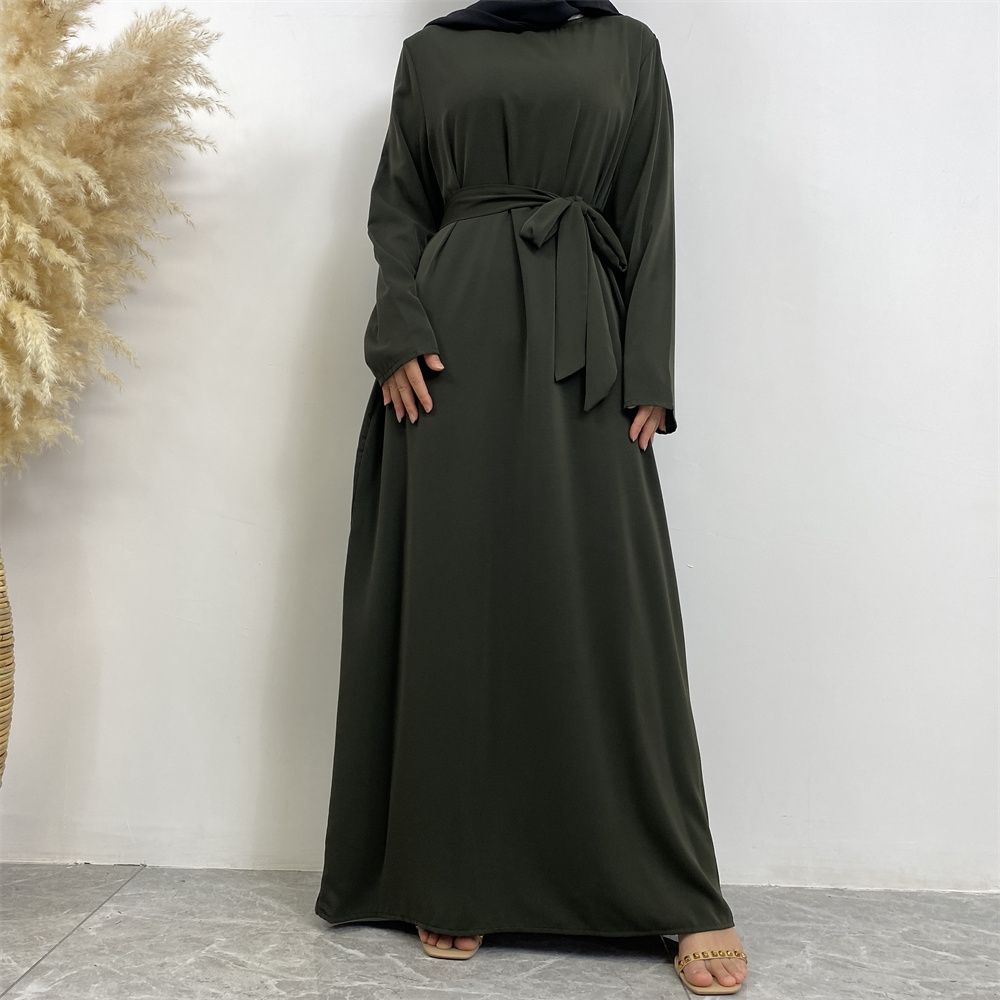 New Middle Eastern Muslim fashion, Dubai, Turkey and Africa's best-selling solid color tie and pocket Muslim dress
