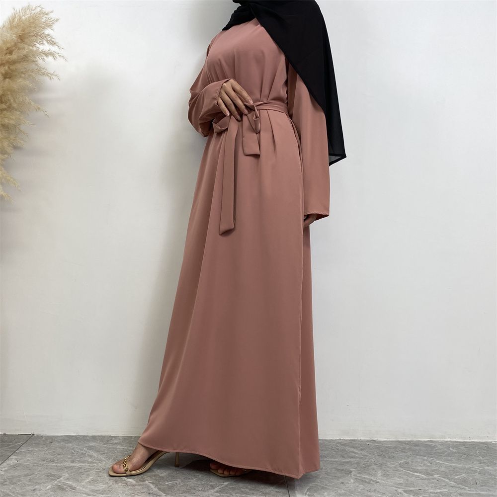 New Middle Eastern Muslim fashion, Dubai, Turkey and Africa's best-selling solid color tie and pocket Muslim dress