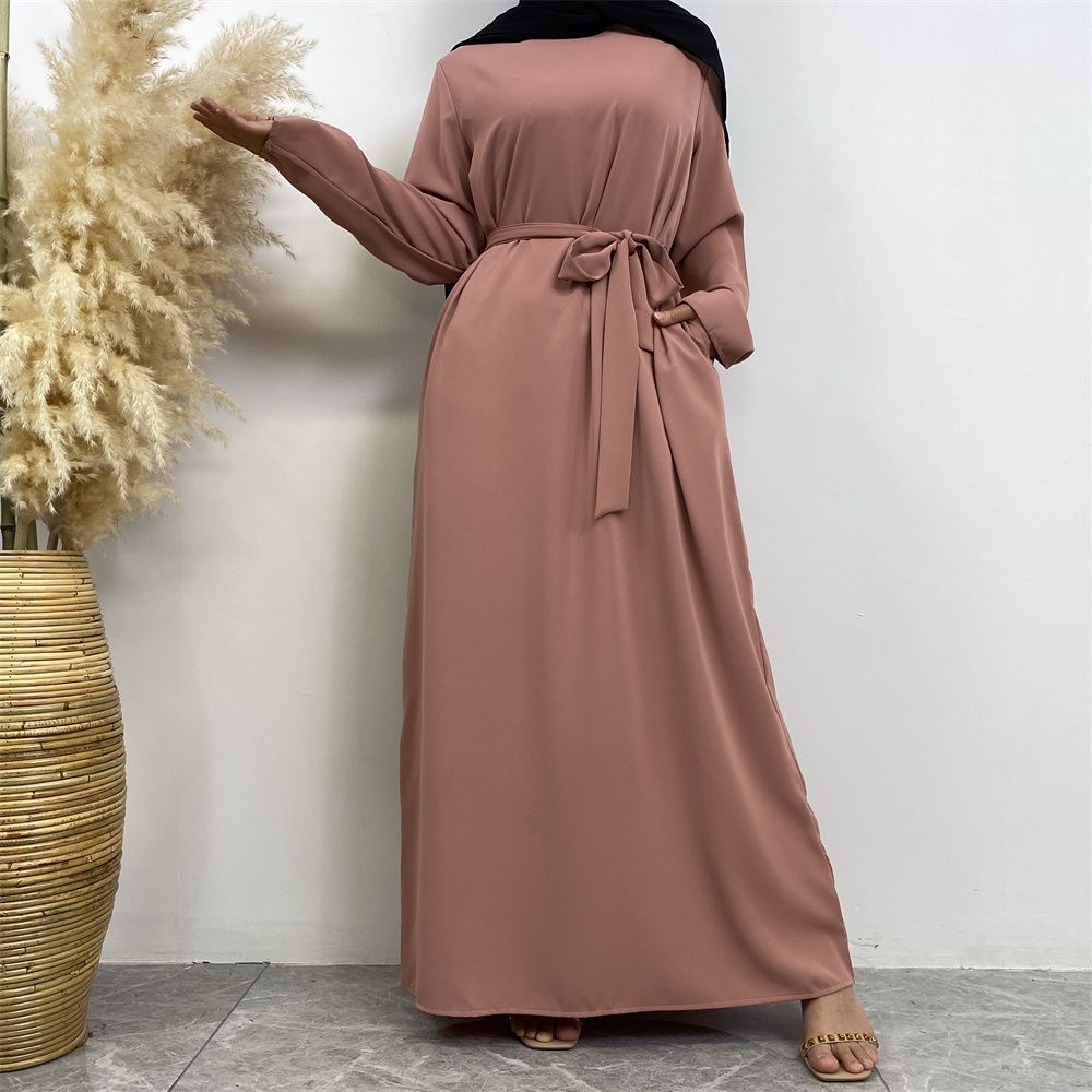 New Middle Eastern Muslim fashion, Dubai, Turkey and Africa's best-selling solid color tie and pocket Muslim dress