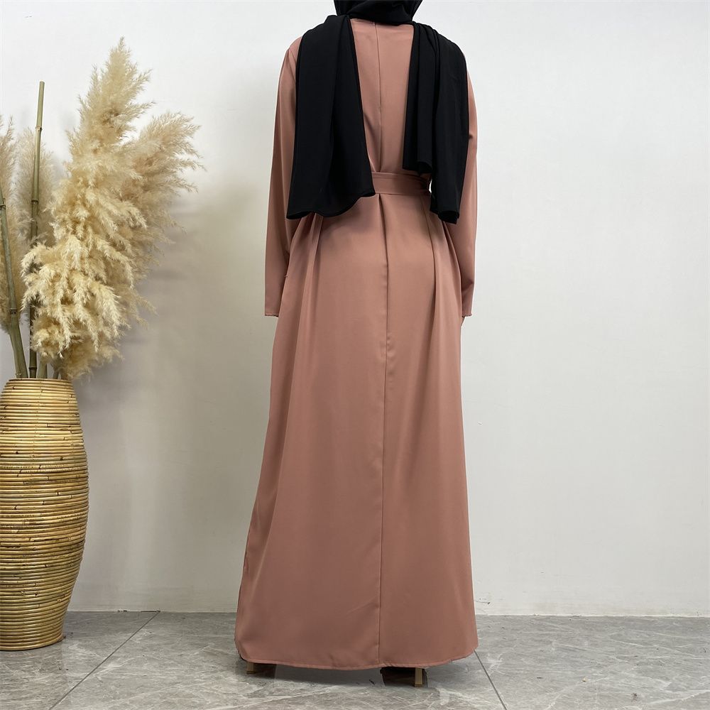 New Middle Eastern Muslim fashion, Dubai, Turkey and Africa's best-selling solid color tie and pocket Muslim dress