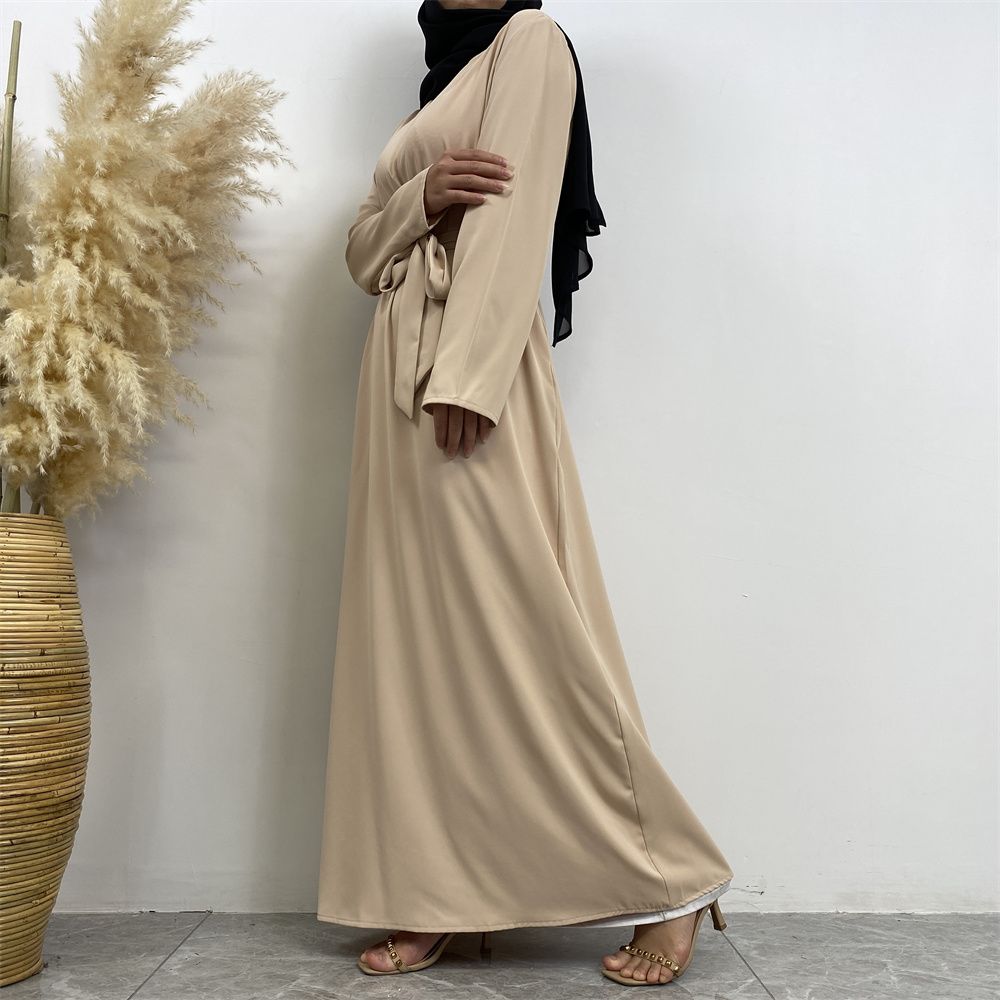 New Middle Eastern Muslim fashion, Dubai, Turkey and Africa's best-selling solid color tie and pocket Muslim dress
