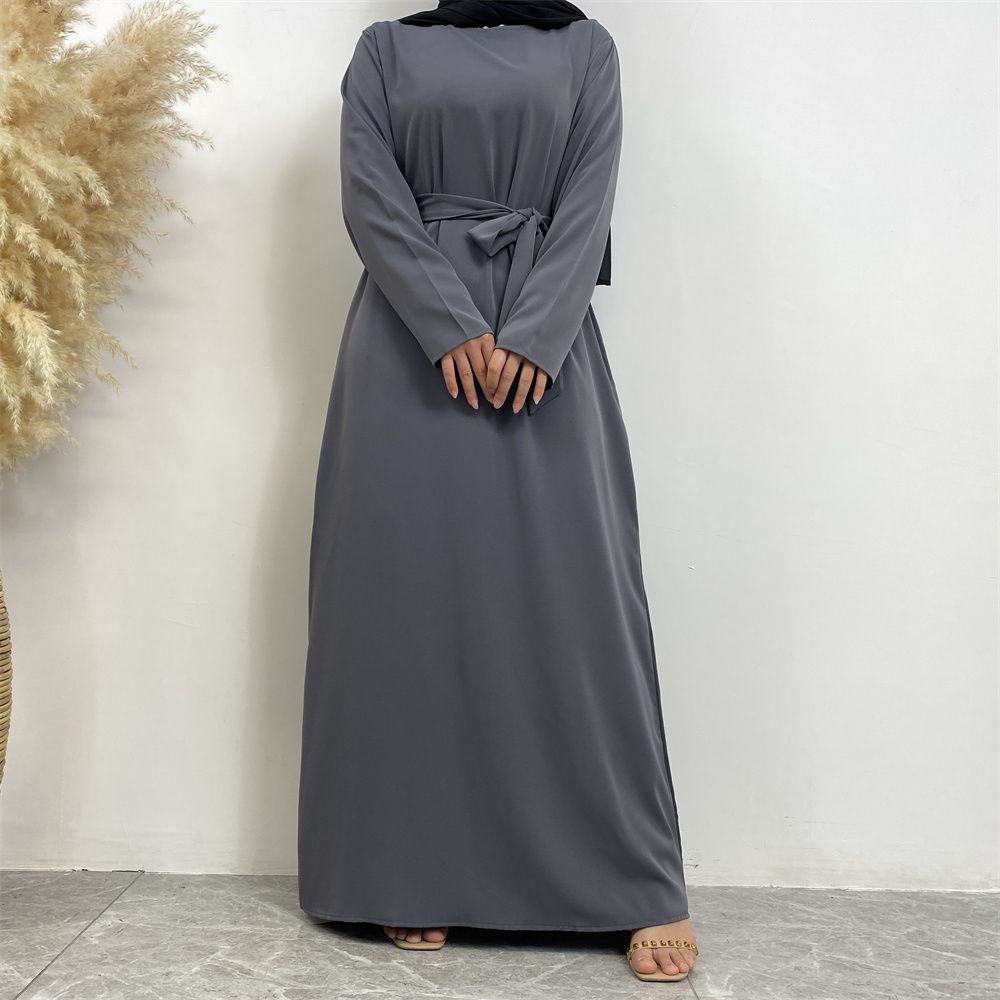 New Middle Eastern Muslim fashion, Dubai, Turkey and Africa's best-selling solid color tie and pocket Muslim dress