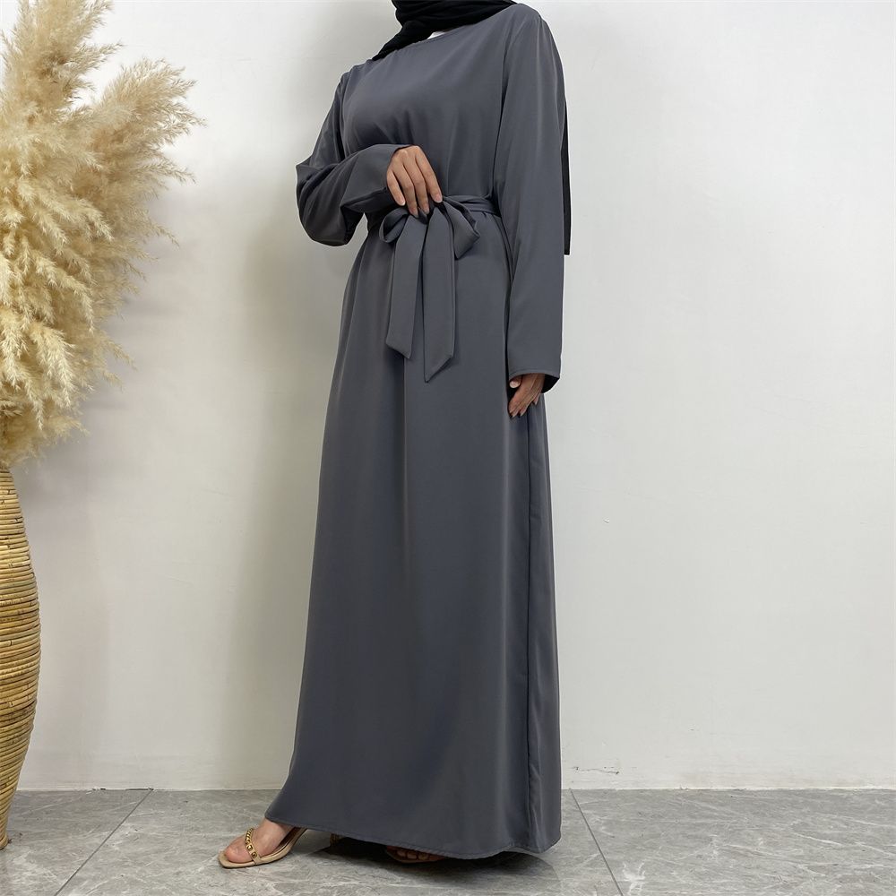New Middle Eastern Muslim fashion, Dubai, Turkey and Africa's best-selling solid color tie and pocket Muslim dress