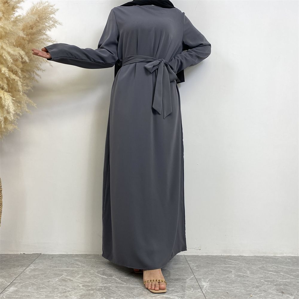 New Middle Eastern Muslim fashion, Dubai, Turkey and Africa's best-selling solid color tie and pocket Muslim dress