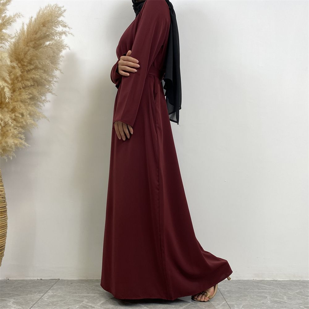 New Middle Eastern Muslim fashion, Dubai, Turkey and Africa's best-selling solid color tie and pocket Muslim dress