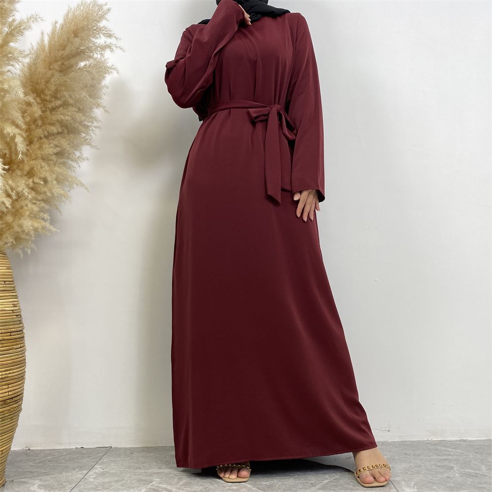 New Middle Eastern Muslim fashion, Dubai, Turkey and Africa's best-selling solid color tie and pocket Muslim dress