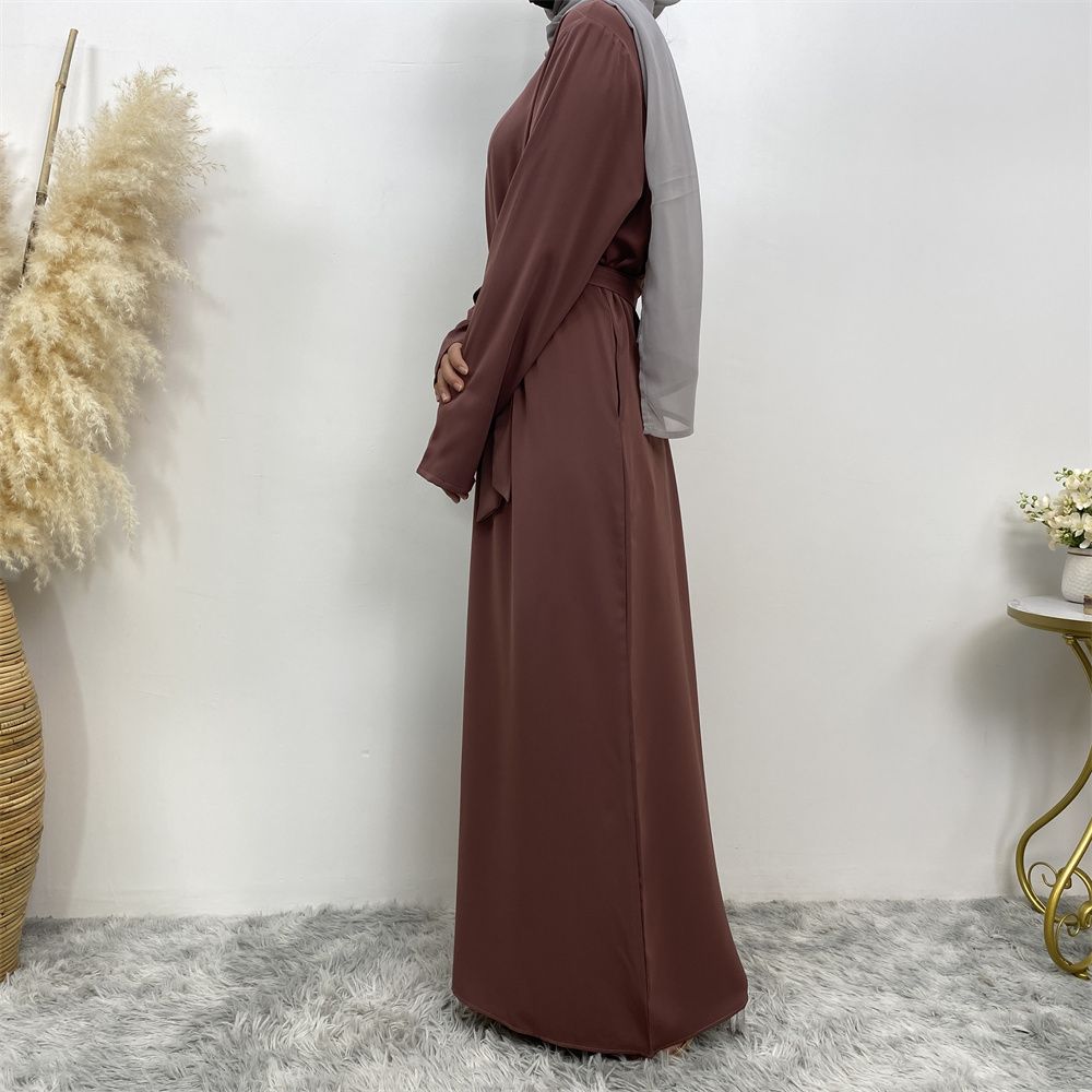New Middle Eastern Muslim fashion, Dubai, Turkey and Africa's best-selling solid color tie and pocket Muslim dress