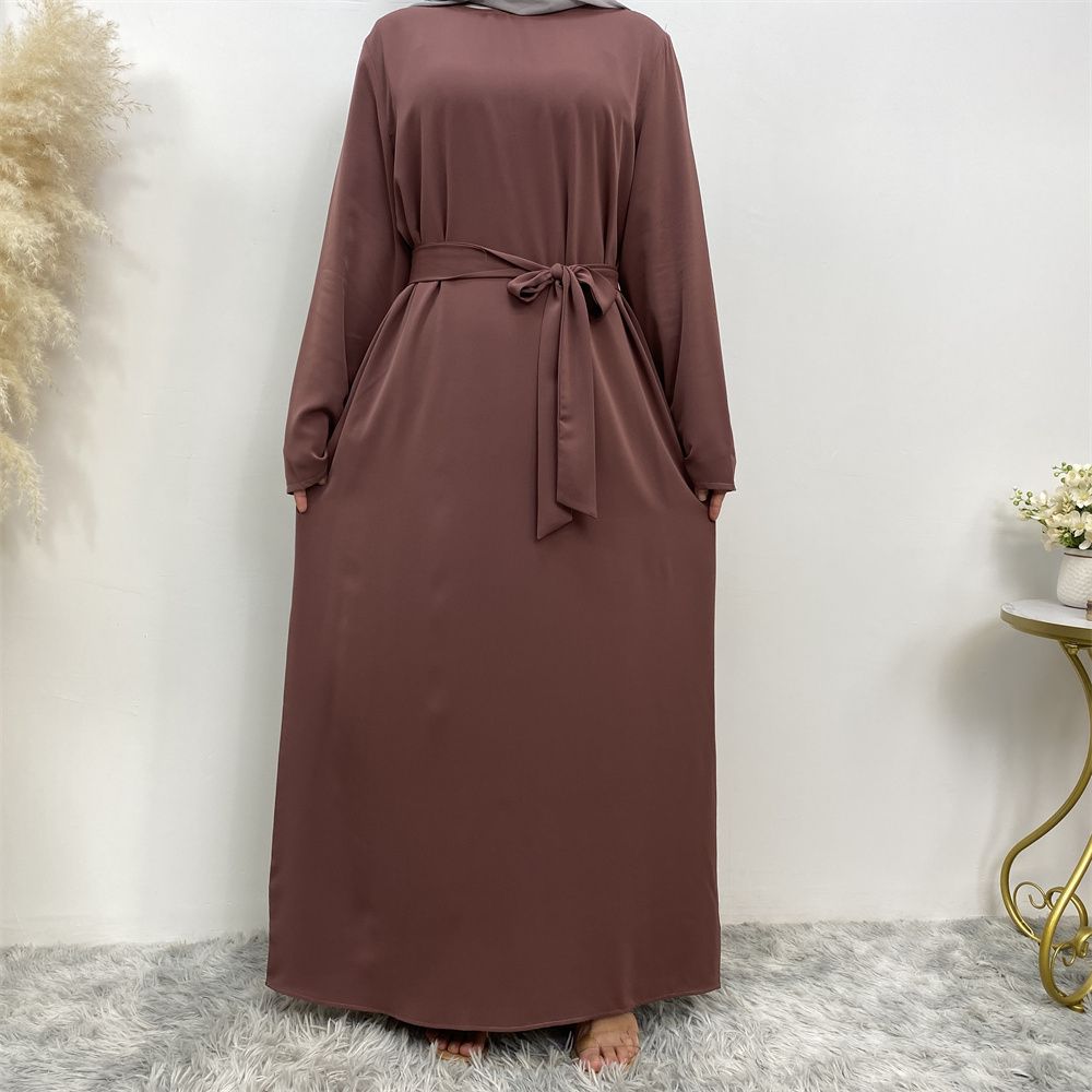 New Middle Eastern Muslim fashion, Dubai, Turkey and Africa's best-selling solid color tie and pocket Muslim dress