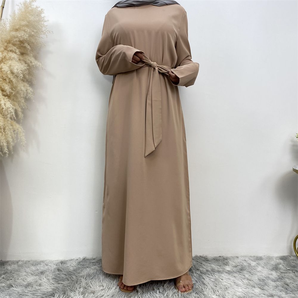 New Middle Eastern Muslim fashion, Dubai, Turkey and Africa's best-selling solid color tie and pocket Muslim dress