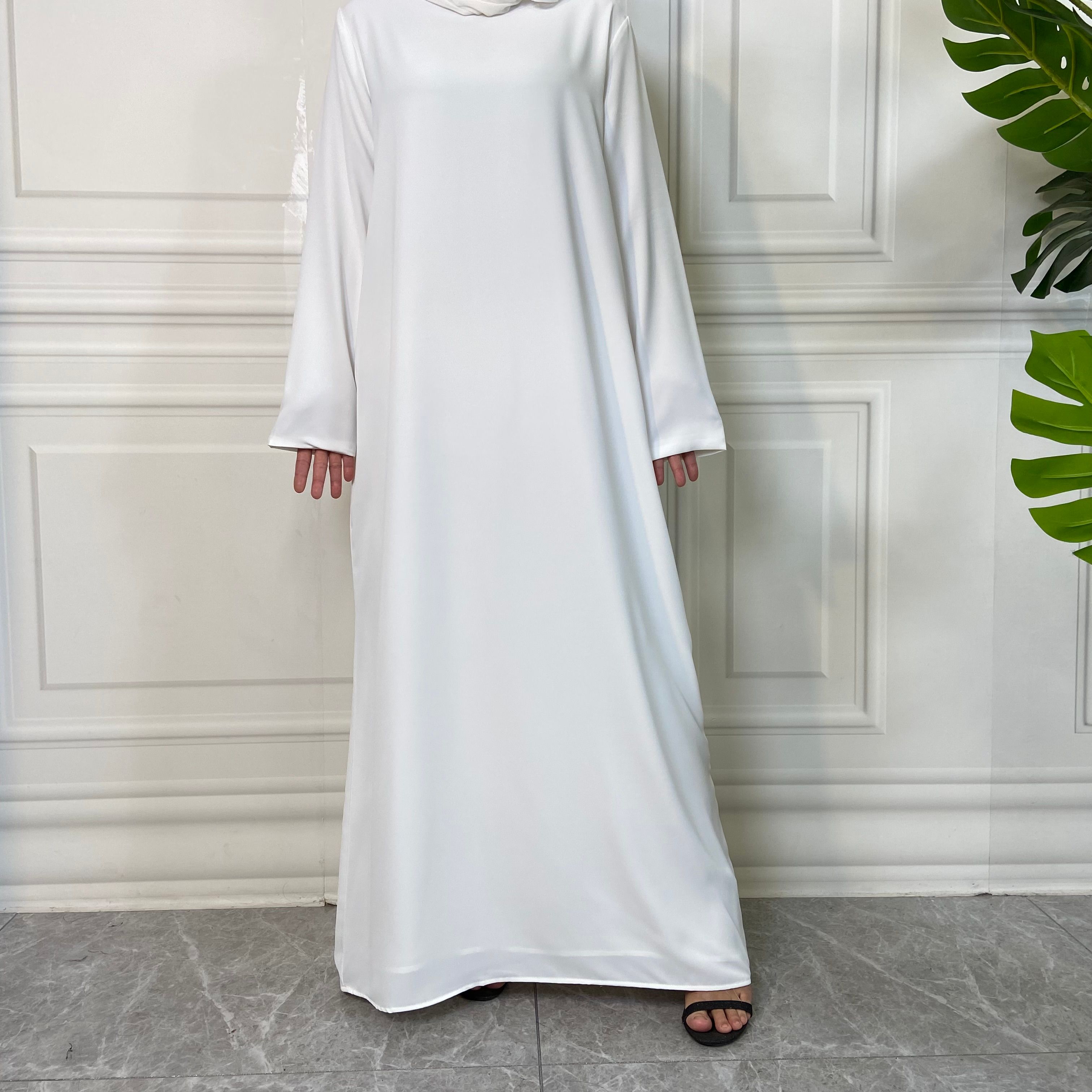 New Middle Eastern Muslim fashion, Dubai, Turkey and Africa's best-selling solid color tie and pocket Muslim dress
