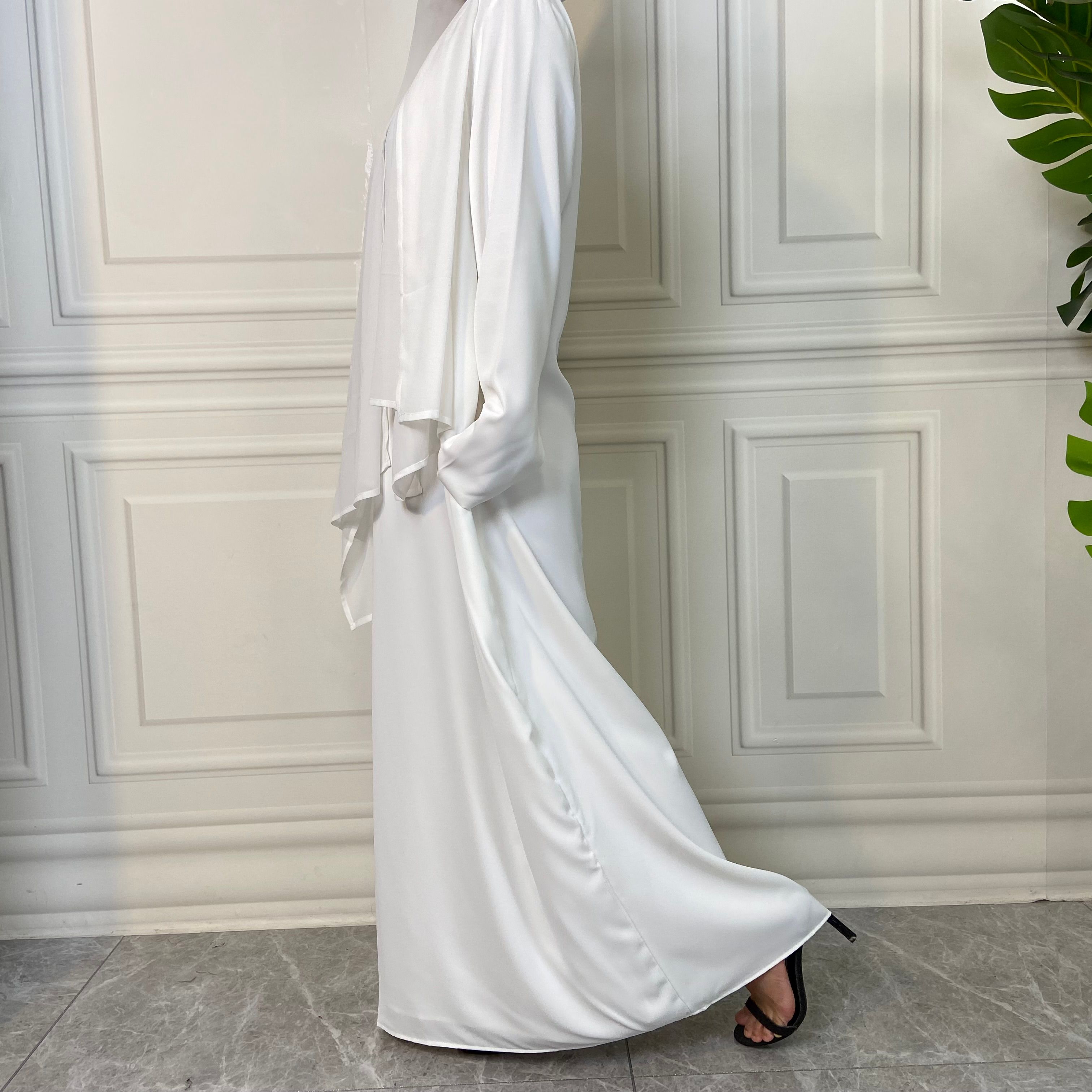 New Middle Eastern Muslim fashion, Dubai, Turkey and Africa's best-selling solid color tie and pocket Muslim dress