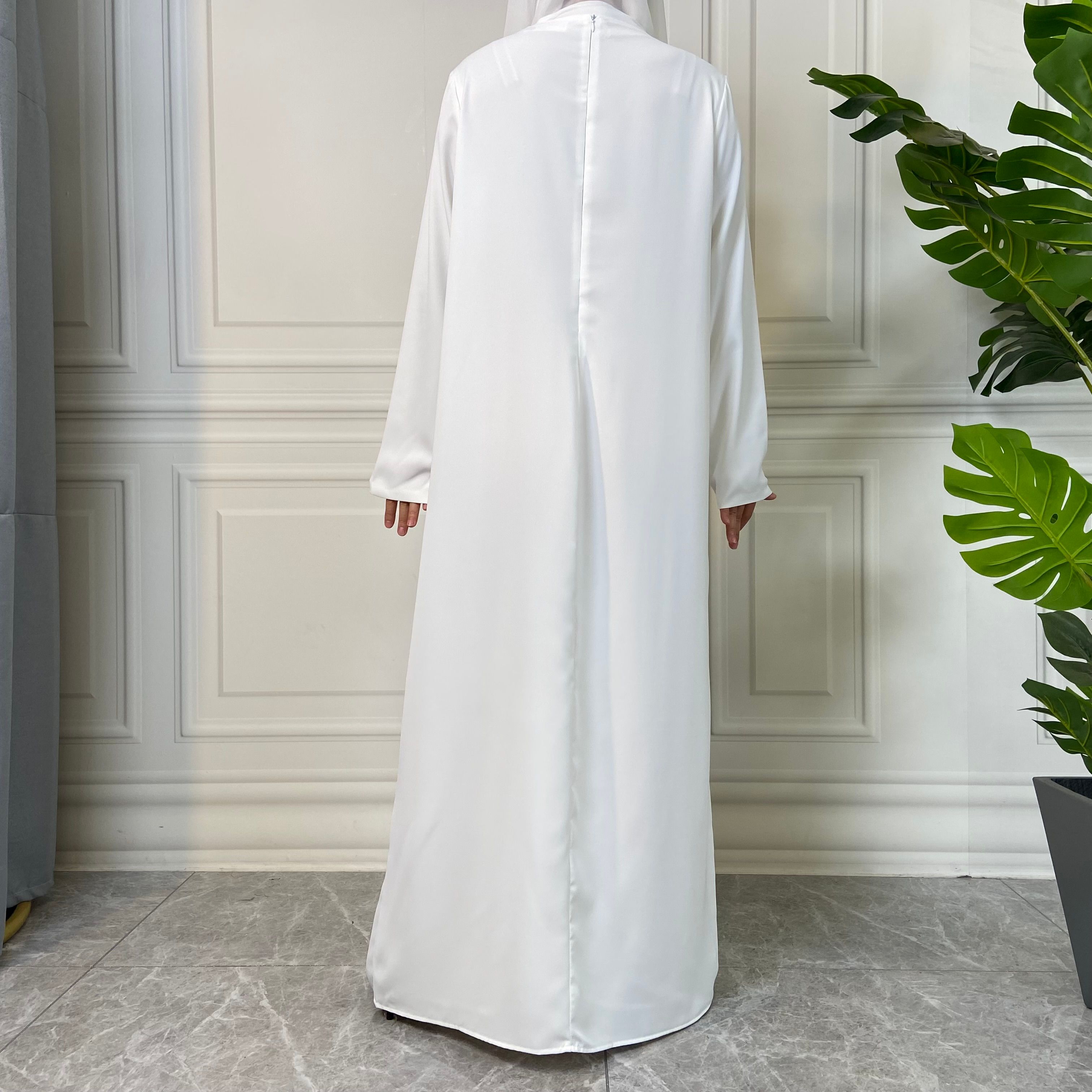 New Middle Eastern Muslim fashion, Dubai, Turkey and Africa's best-selling solid color tie and pocket Muslim dress