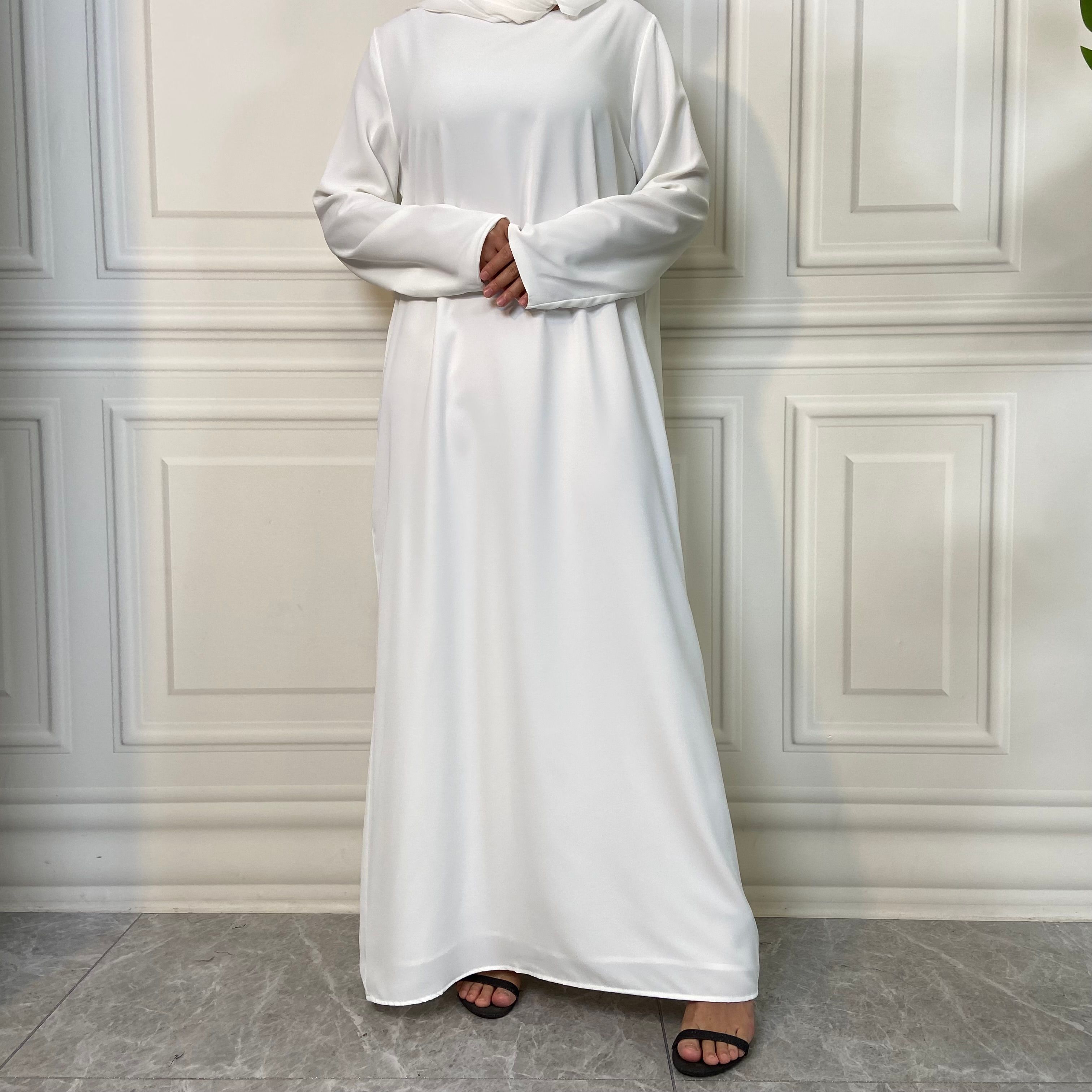 New Middle Eastern Muslim fashion, Dubai, Turkey and Africa's best-selling solid color tie and pocket Muslim dress