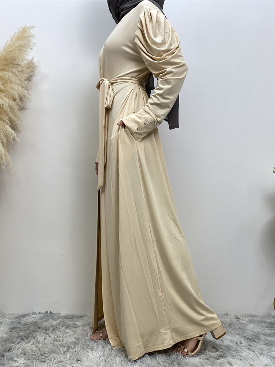 A new, simple and fashionable women's dress in solid color Muslim cardigan is selling well in Dubai, Turkey, Arabia and Africa in the Middle East