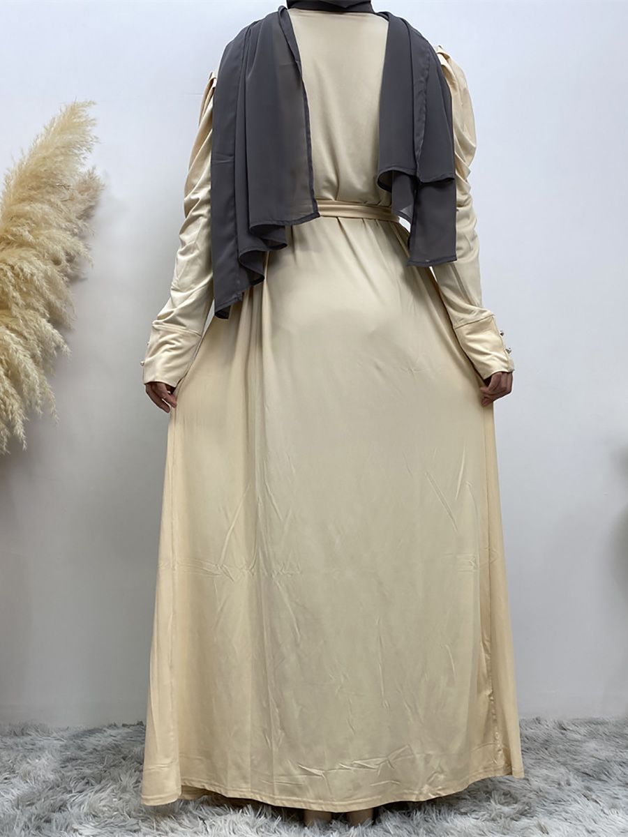 A new, simple and fashionable women's dress in solid color Muslim cardigan is selling well in Dubai, Turkey, Arabia and Africa in the Middle East