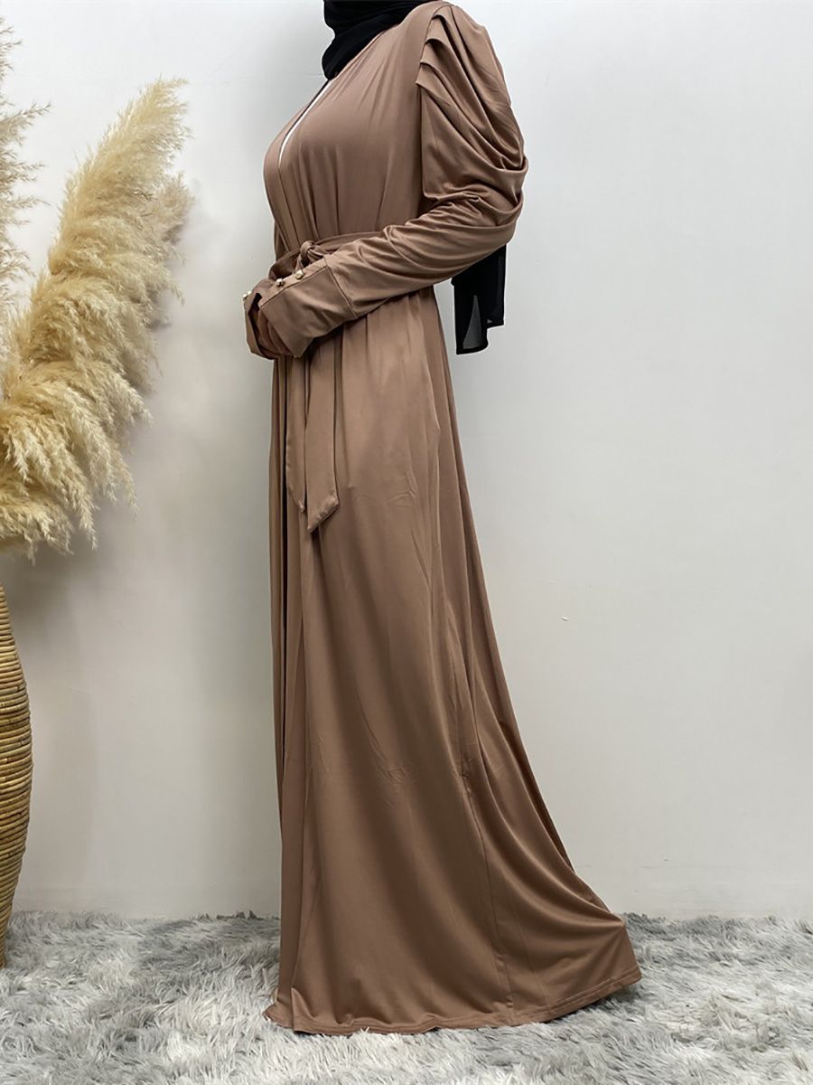 A new, simple and fashionable women's dress in solid color Muslim cardigan is selling well in Dubai, Turkey, Arabia and Africa in the Middle East