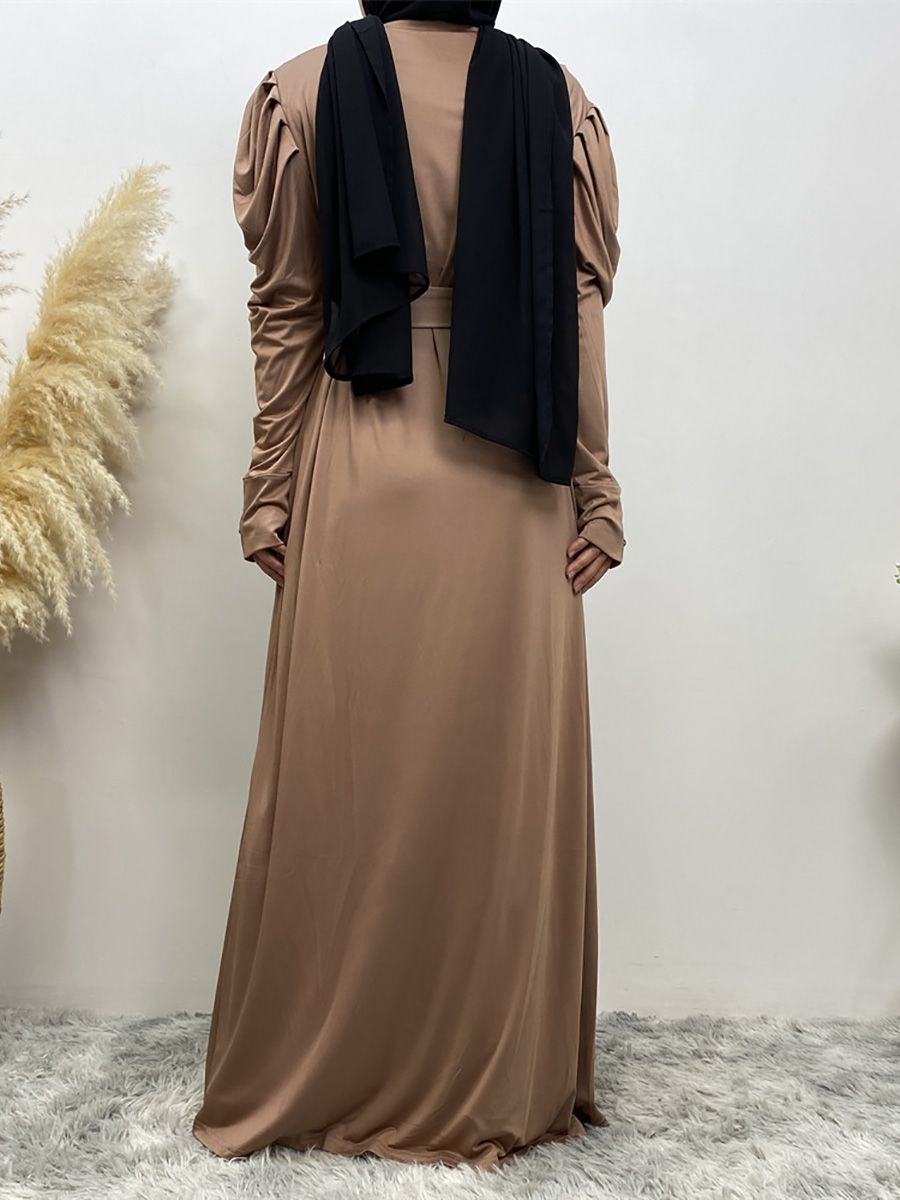 A new, simple and fashionable women's dress in solid color Muslim cardigan is selling well in Dubai, Turkey, Arabia and Africa in the Middle East