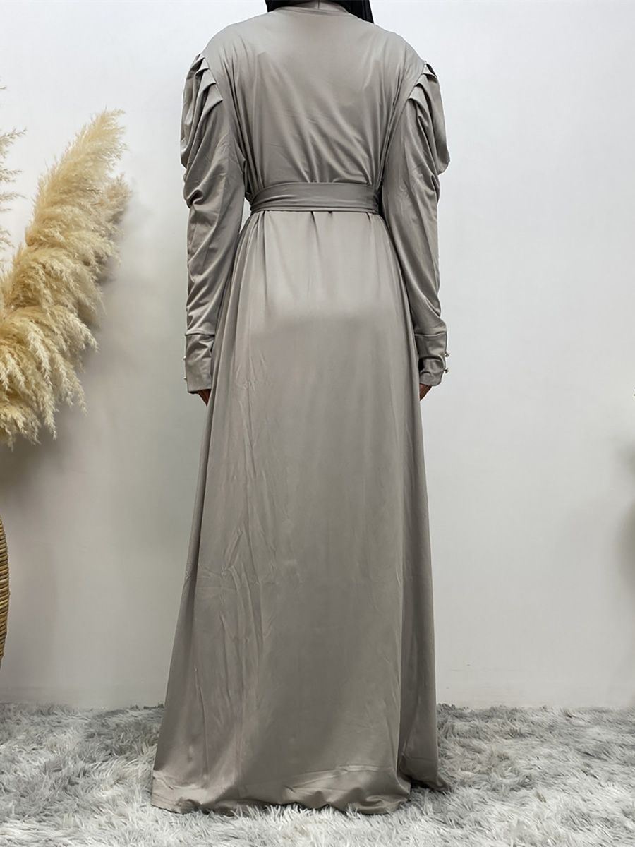 A new, simple and fashionable women's dress in solid color Muslim cardigan is selling well in Dubai, Turkey, Arabia and Africa in the Middle East