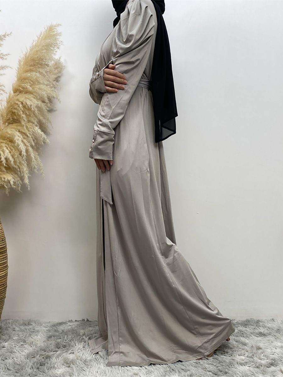 A new, simple and fashionable women's dress in solid color Muslim cardigan is selling well in Dubai, Turkey, Arabia and Africa in the Middle East