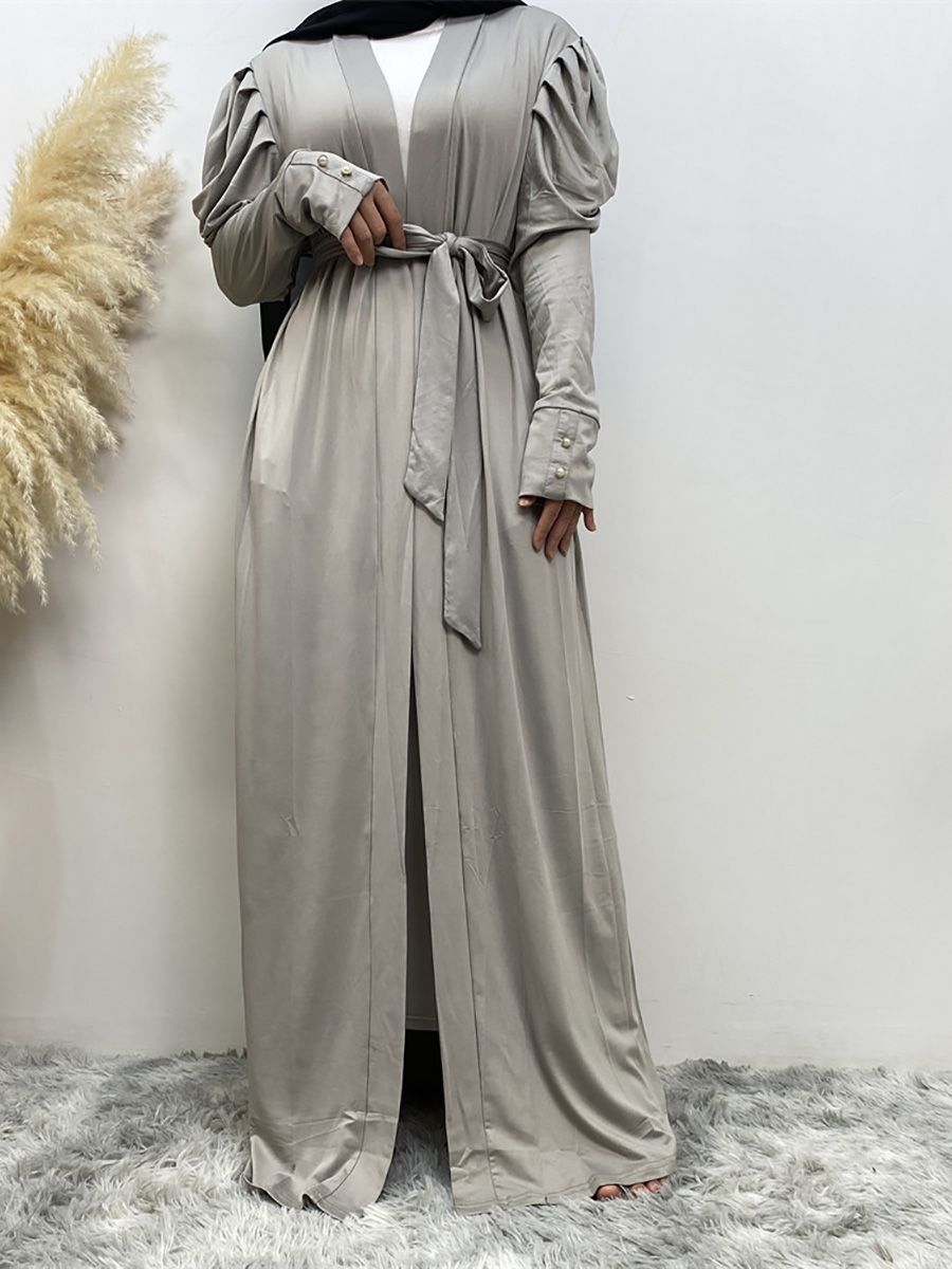 A new, simple and fashionable women's dress in solid color Muslim cardigan is selling well in Dubai, Turkey, Arabia and Africa in the Middle East