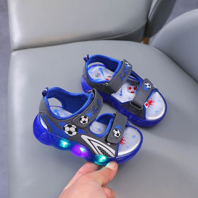 Open kids shoes for boys with lights at the soles, they are classic and fashionable for kids. The open shoes are comfortable to walk with and durable