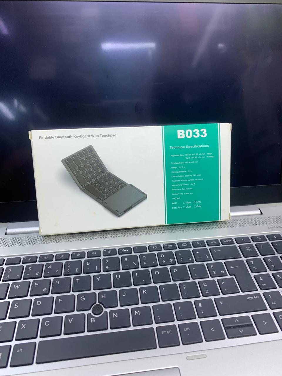 FOLDABLE BLUETOOTH KEYBOARD WITH TOUCHPAD RECHARGABLE AND COMPATIBLE TO SMART DEVICES