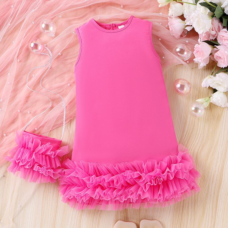 Summer dress for girls in children's clothing. It's a sleeveless A-line princess dress with a tiered cake-style tulle skirt, and it comes with a bag
