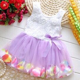 New summer style sleeveless dress for little girls with petal-shaped hem. Girl's children's dress. Girl's tulle dress