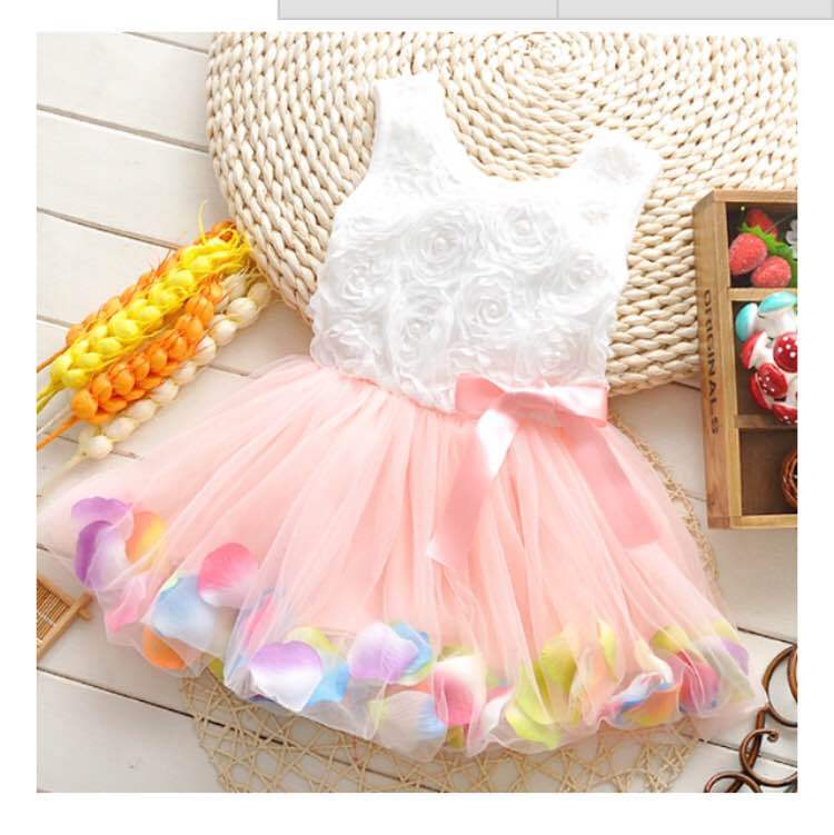 New summer style sleeveless dress for little girls with petal-shaped hem. Girl's children's dress. Girl's tulle dress