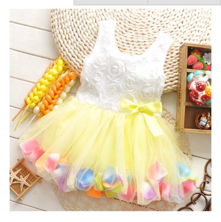 New summer style sleeveless dress for little girls with petal-shaped hem. Girl's children's dress. Girl's tulle dress