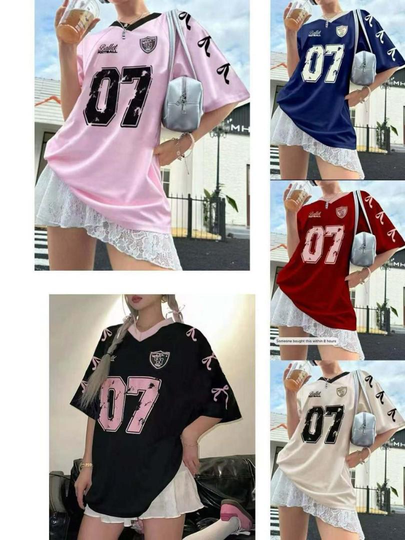 Trendy Oversized 07 Jersey T-Shirt – Casual Streetwear Top with Lace Hem Style, Graphic Print & Ribbon Sleeve Detail. Available in Pink, Black, White, Red & Blue for Fashionable Everyday Wear