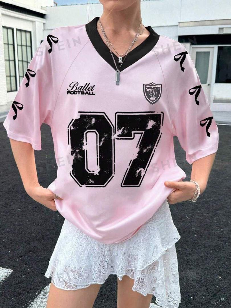 Trendy Oversized 07 Jersey T-Shirt – Casual Streetwear Top with Lace Hem Style, Graphic Print & Ribbon Sleeve Detail. Available in Pink, Black, White, Red & Blue for Fashionable Everyday Wear