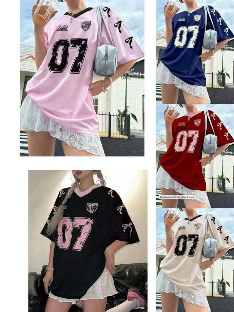 Trendy Oversized 07 Jersey T-Shirt – Casual Streetwear Top with Lace Hem Style, Graphic Print & Ribbon Sleeve Detail. Available in Pink, Black, White, Red & Blue for Fashionable Everyday Wear