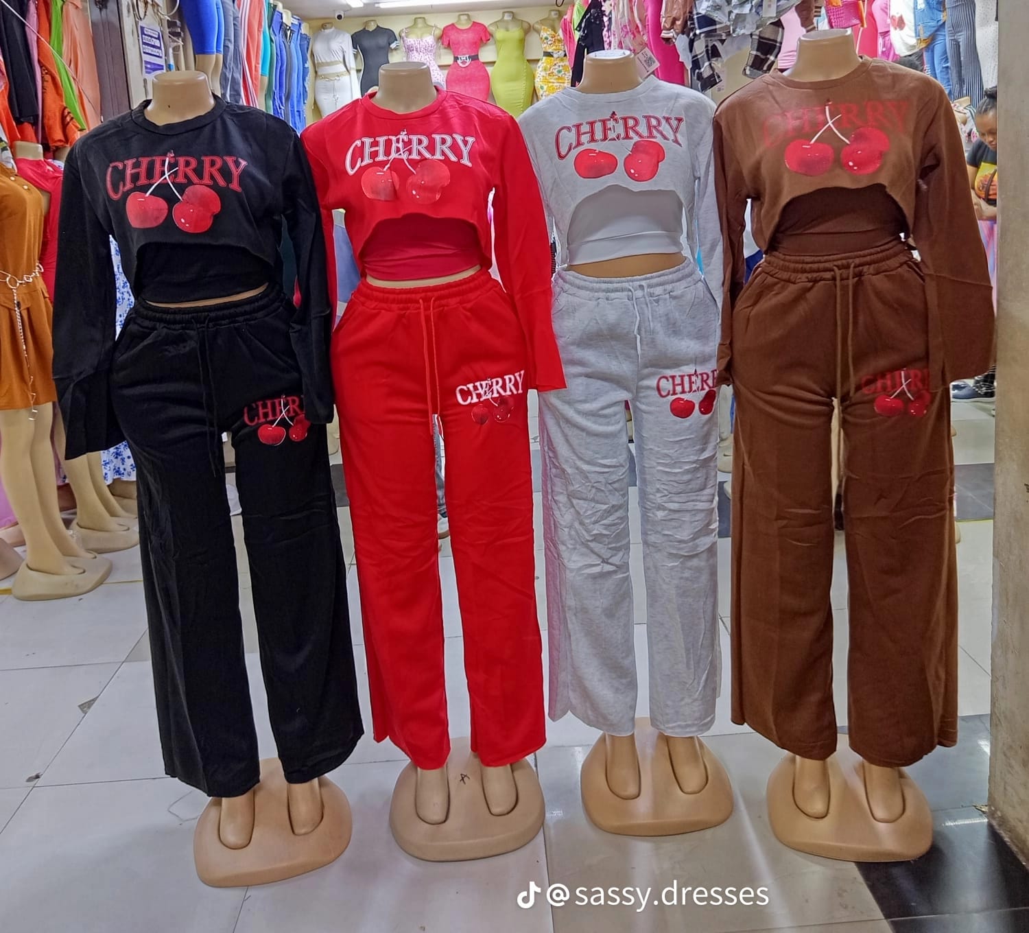 Cherry Luxe Two-Piece Lounge Set – Trendy Crop Sweatshirt & Wide-Leg Joggers with Bold Cherry Print, Soft Cozy Fabric, Street-Style Chic, Perfect for Casual Wear, Travel, or Everyday Fashion