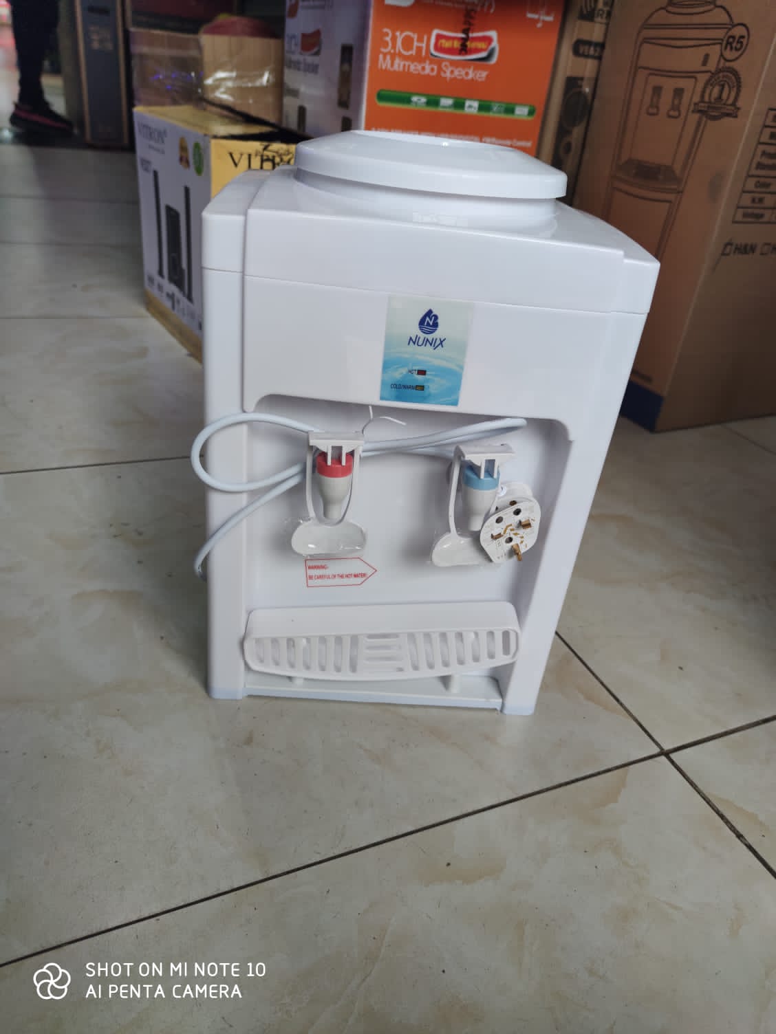 Nunix K1 Tabletop Hot & Normal Water Dispenser – Compact and Efficient Countertop Appliance – Ideal for Home, Office, and Small Spaces – Sleek Design with Reliable Heating Function