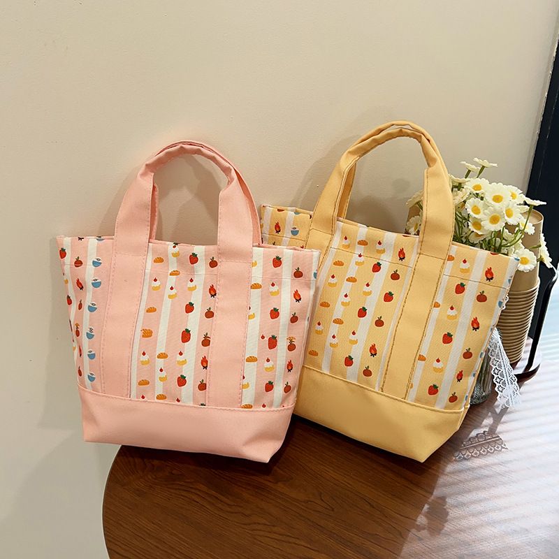 Carrying a bento bag while going out for work, commuting, mom's handbag, cute girl's handbag, and canvas bag